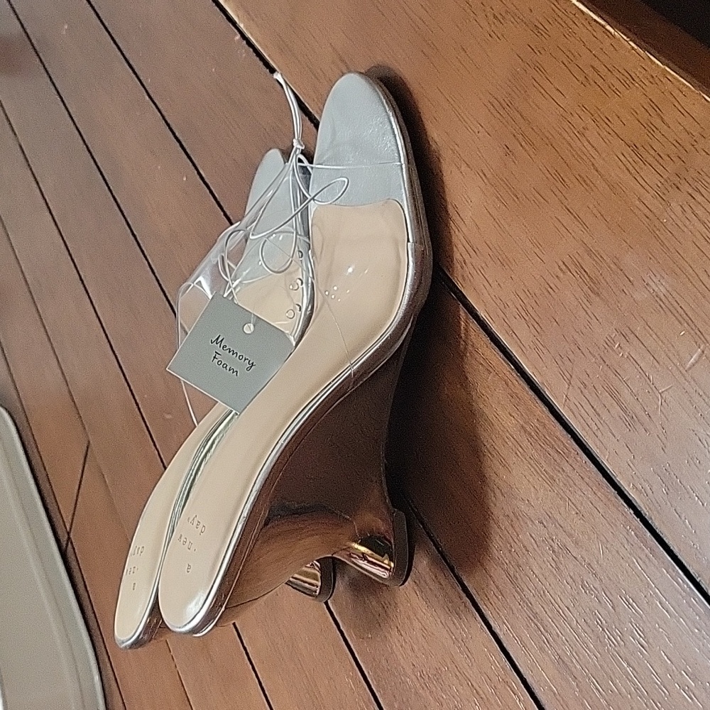 Womans size 6 silver with clear strap wedges